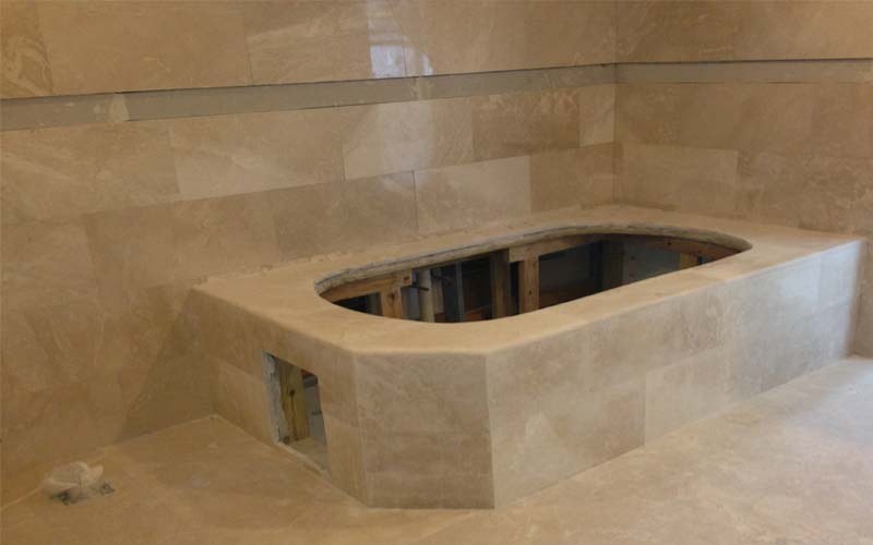 Finished bathroom remodel with new tile and fixtures